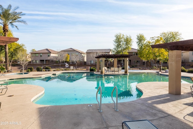 view of swimming pool with a pergola and a patio area