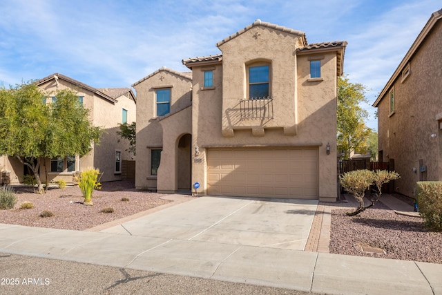 mediterranean / spanish-style home featuring a garage