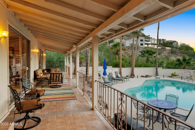 exterior space featuring a fenced in pool