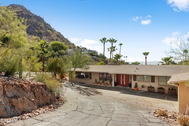 view of front facade with a mountain view