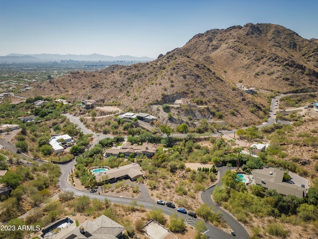 birds eye view of property featuring a mountain view