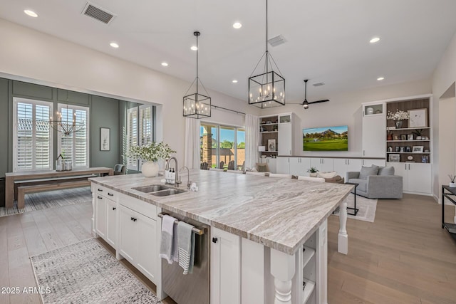3814 W Running Deer Trl, Phoenix, AZ 85083 - kitchen with a chandelier, dishwasher, white cabinets, recessed lighting, and light wood-style flooring
