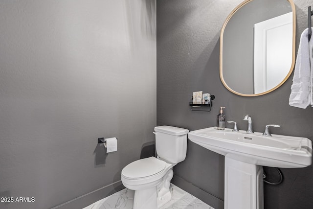 3814 W Running Deer Trl, Phoenix, AZ 85083 - bathroom featuring toilet and marble finish flooring