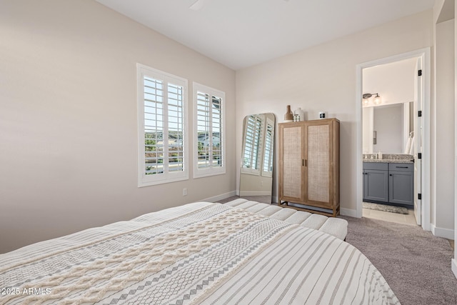 3814 W Running Deer Trl, Phoenix, AZ 85083 - carpeted bedroom featuring baseboards and ensuite bathroom