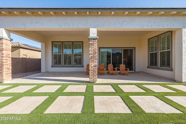 3814 W Running Deer Trl, Phoenix, AZ 85083 - back of property with stucco siding and a patio