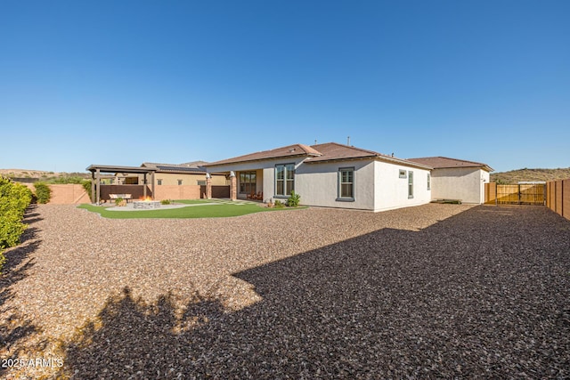 3814 W Running Deer Trl, Phoenix, AZ 85083 - rear view of house featuring a fenced backyard, a patio area, and stucco siding