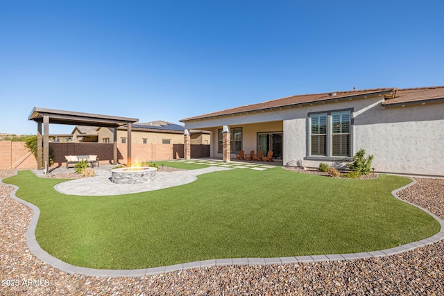 3814 W Running Deer Trl, Phoenix, AZ 85083 - back of house featuring stucco siding, a patio, a fenced backyard, and an outdoor fire pit