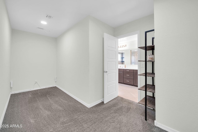 19026 W Becker Ln, Surprise, AZ 85388 - unfurnished room with carpet flooring and baseboards