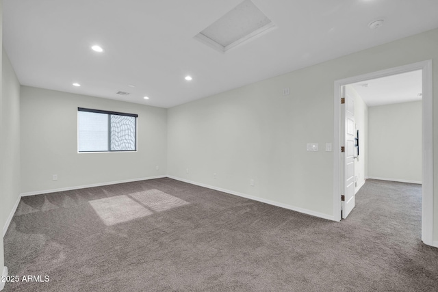 19026 W Becker Ln, Surprise, AZ 85388 - carpeted empty room with attic access, baseboards, recessed lighting, and a smoke detector