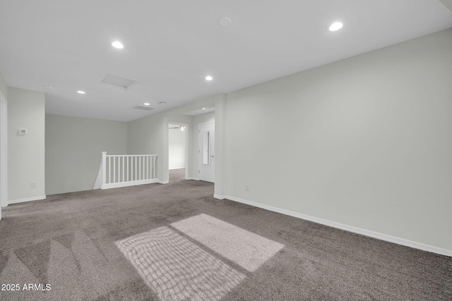 19026 W Becker Ln, Surprise, AZ 85388 - spare room featuring attic access, carpet flooring, recessed lighting, and baseboards