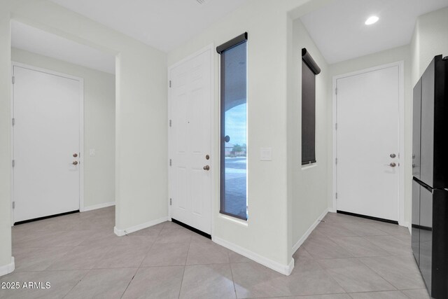 19026 W Becker Ln, Surprise, AZ 85388 - foyer entrance with light tile patterned flooring and baseboards