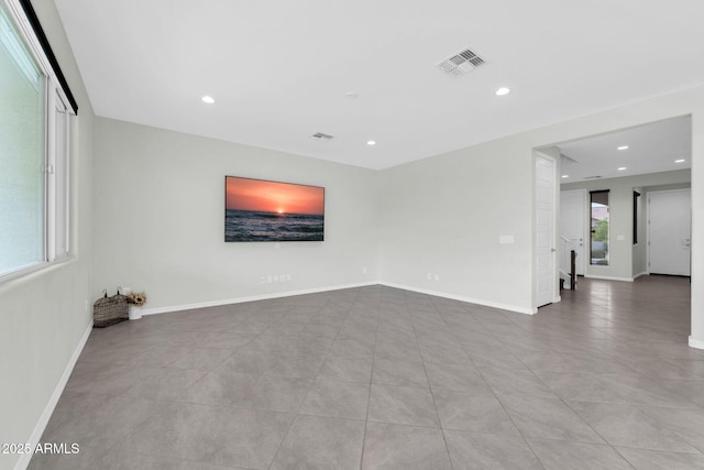 19026 W Becker Ln, Surprise, AZ 85388 - tiled spare room featuring recessed lighting and baseboards