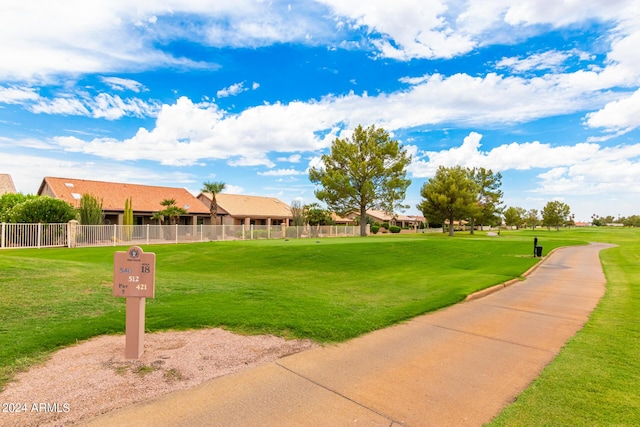 view of community featuring a yard