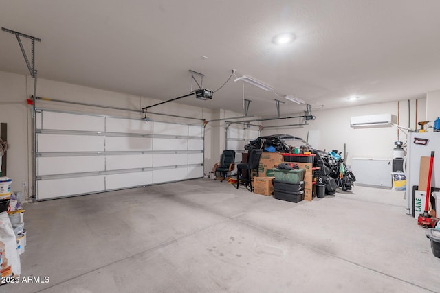 9454 E Alfalfa Dr, Florence, AZ 85132 - garage with a garage door opener, a wall mounted air conditioner, and recessed lighting