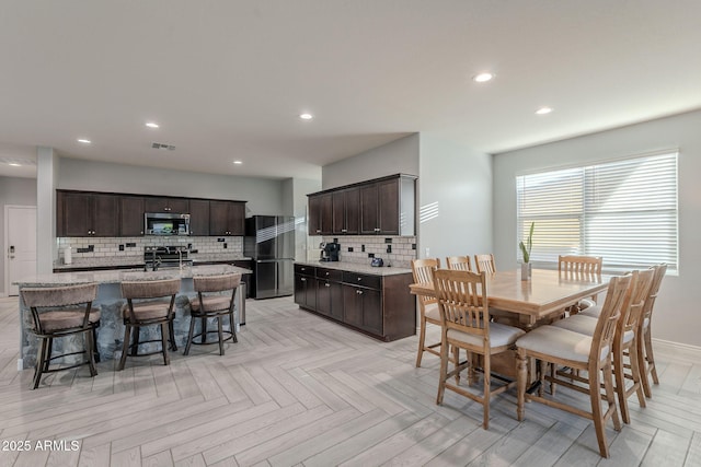 9454 E Alfalfa Dr, Florence, AZ 85132 - dining area with recessed lighting and baseboards