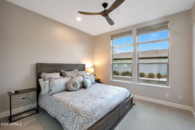 bedroom with ceiling fan and carpet floors