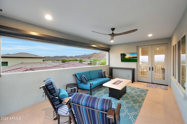 view of patio / terrace featuring ceiling fan, french doors, and an outdoor hangout area