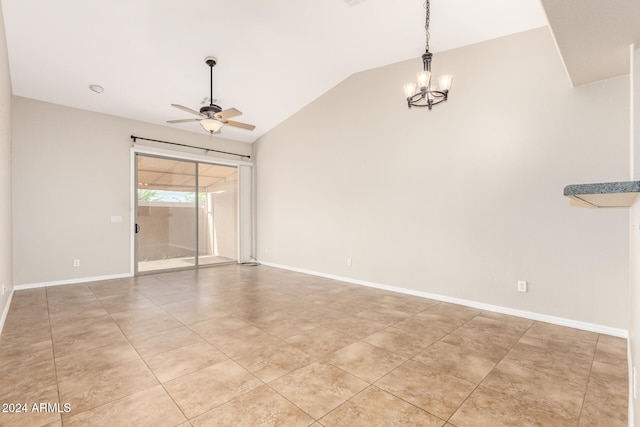 tiled spare room with ceiling fan with notable chandelier and lofted ceiling