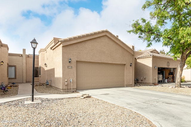 view of front of property featuring a garage