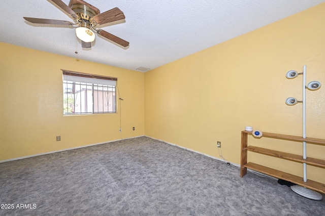 18012 N 37th Dr, Glendale, AZ 85308 - carpeted empty room with visible vents, a ceiling fan, and a textured ceiling