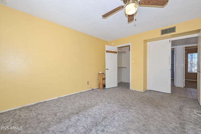 18012 N 37th Dr, Glendale, AZ 85308 - unfurnished bedroom featuring visible vents, a ceiling fan, carpet, and a textured ceiling