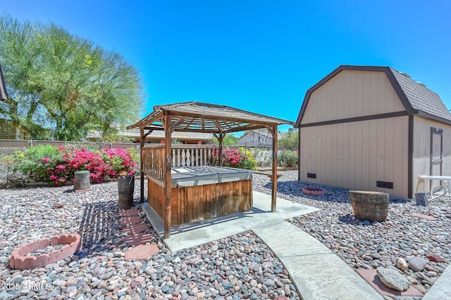 18012 N 37th Dr, Glendale, AZ 85308 - view of patio with a storage shed, an outdoor structure, fence, a jacuzzi, and a gazebo