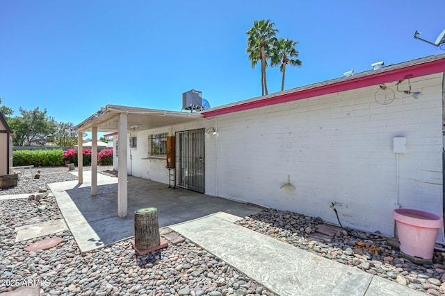 18012 N 37th Dr, Glendale, AZ 85308 - back of property featuring concrete block siding and a patio