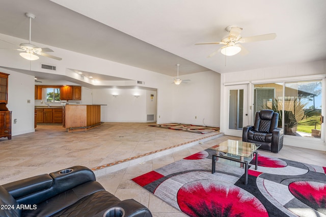 living room with sink and ceiling fan