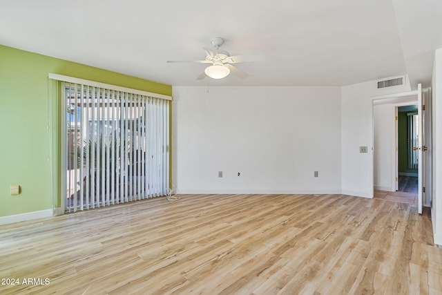 empty room featuring light hardwood / wood-style floors and ceiling fan