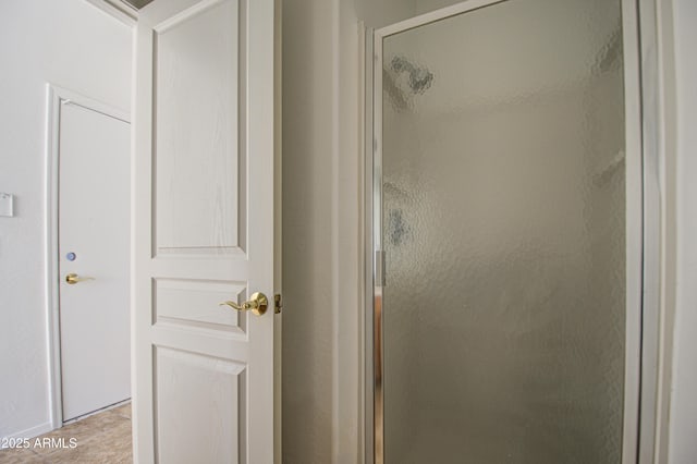 full bathroom with a shower stall