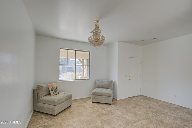 sitting room featuring visible vents and baseboards