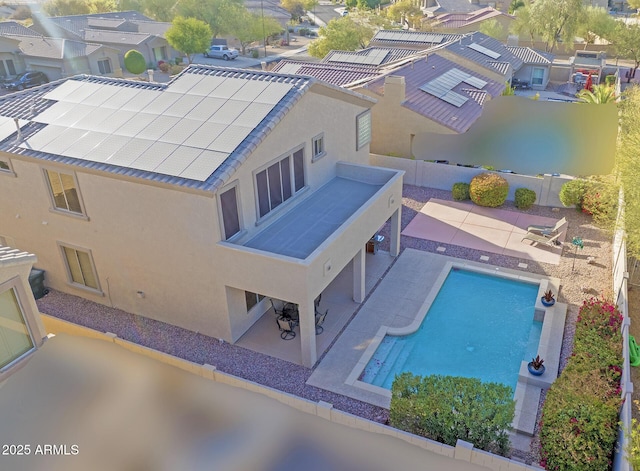 view of pool with a patio area, a residential view, a fenced in pool, and a fenced backyard