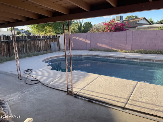 view of pool featuring a patio