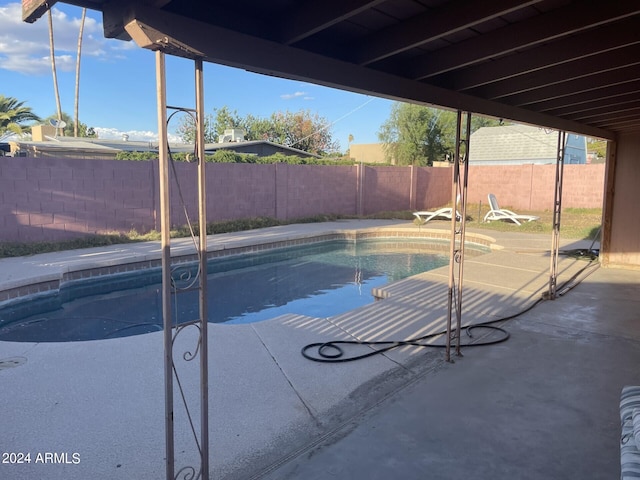 view of pool featuring a patio