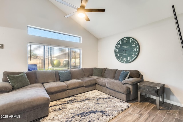 living room featuring ceiling fan, wood-type flooring, and high vaulted ceiling