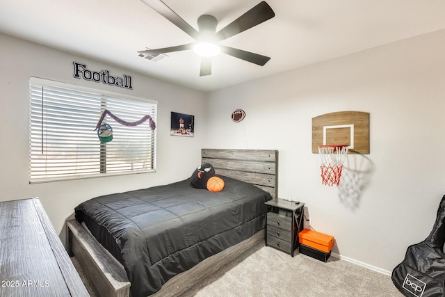 bedroom featuring ceiling fan and light colored carpet