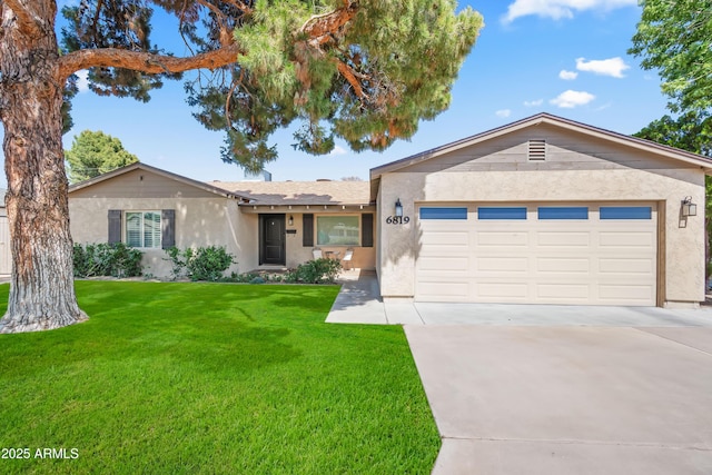 6819 N 10th Pl, Phoenix, AZ 85014 - single story home with stucco siding, a garage, a front yard, and driveway