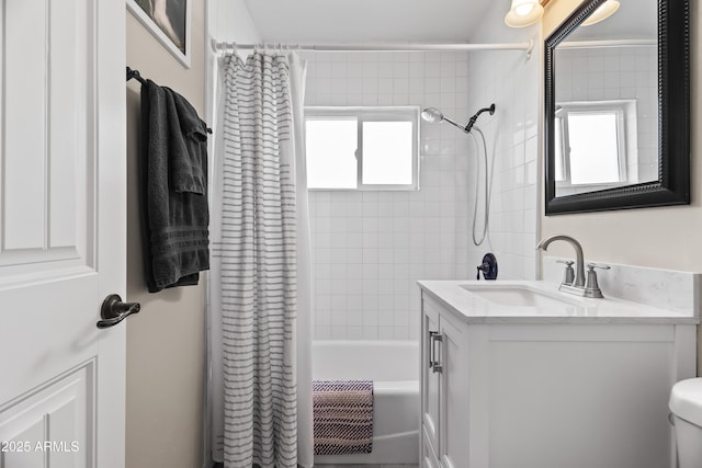 6819 N 10th Pl, Phoenix, AZ 85014 - bathroom featuring vanity, shower / bath combo with shower curtain, and toilet