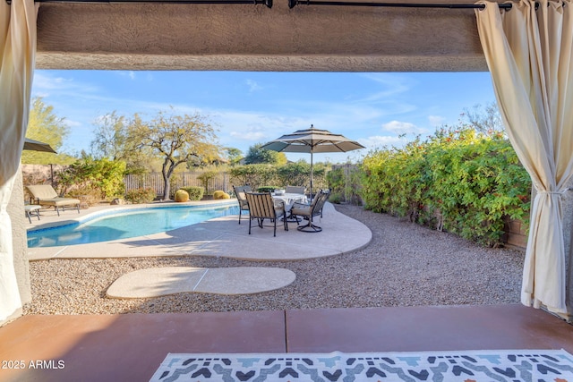 view of pool featuring a patio area