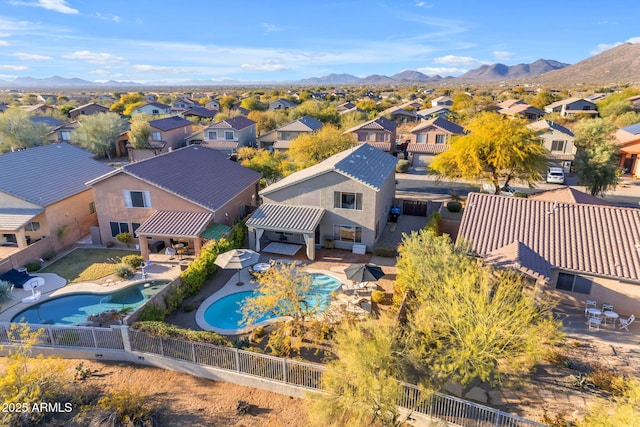 bird's eye view with a mountain view