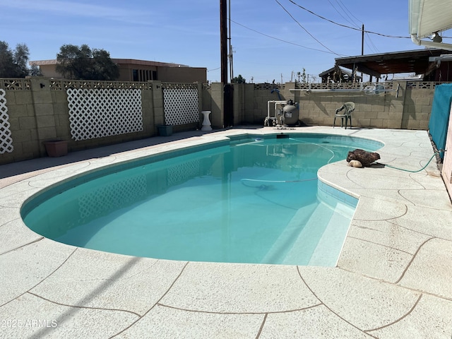 view of swimming pool with a fenced in pool and a fenced backyard