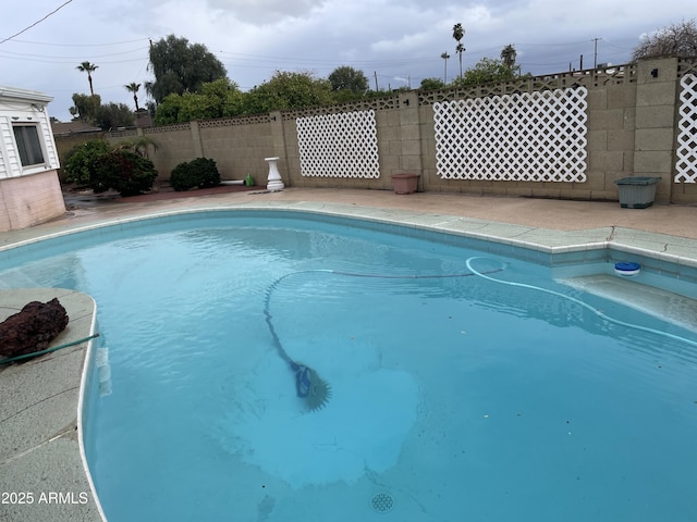 view of pool featuring a fenced in pool and fence private yard