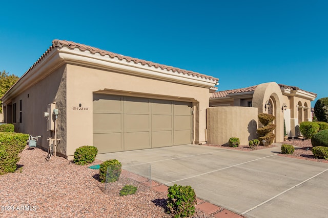 view of front of home featuring a garage