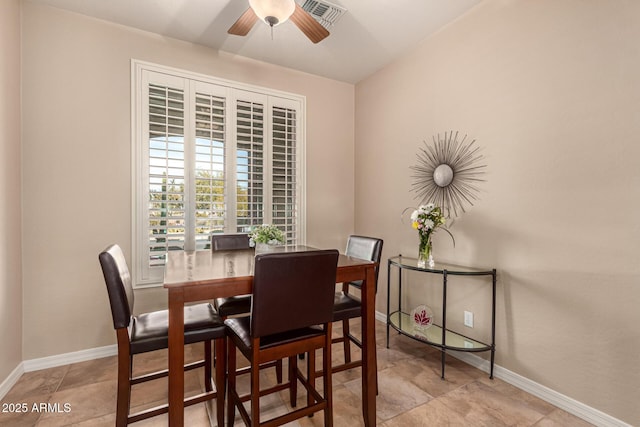 dining area with ceiling fan