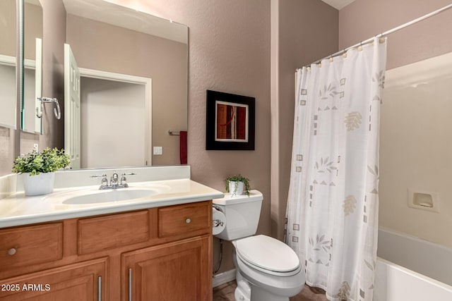 full bathroom with toilet, vanity, and shower / tub combo with curtain