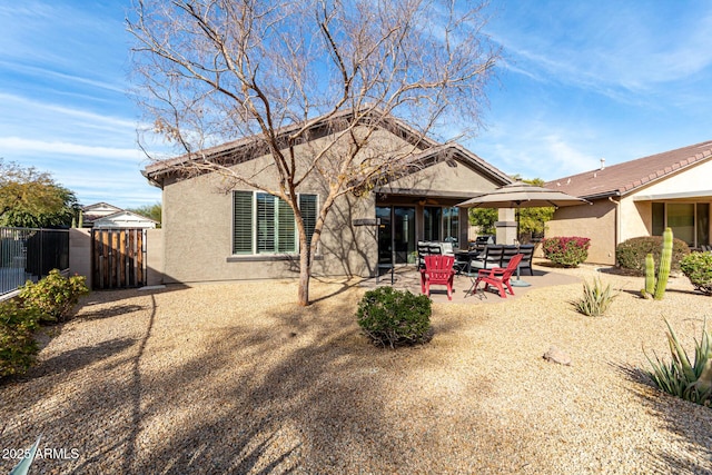 back of house featuring a patio