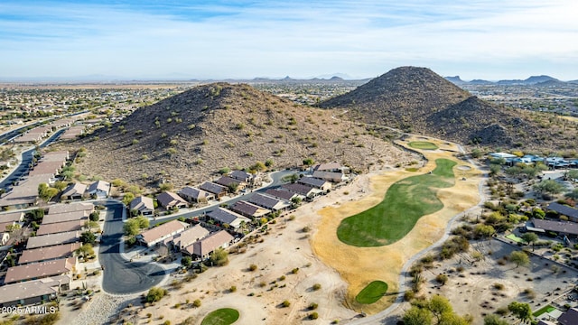 birds eye view of property featuring a mountain view