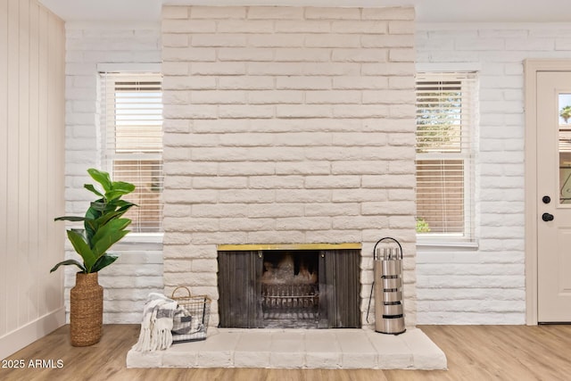 2015 E Southern Ave Unit 16, Tempe, AZ 85282 - detailed view of wood finished floors and a large fireplace