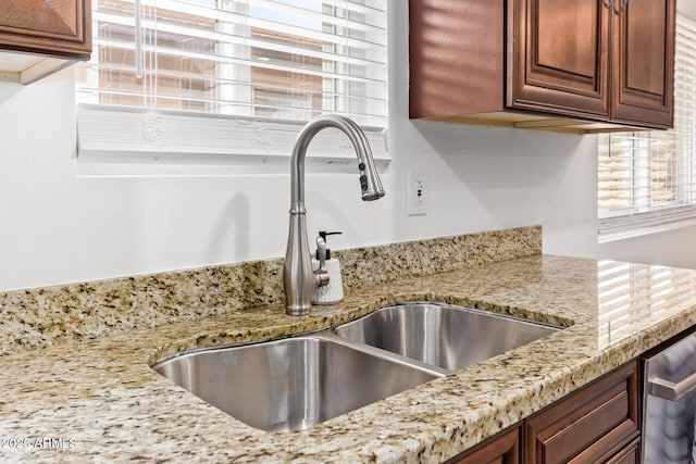 2015 E Southern Ave Unit 16, Tempe, AZ 85282 - kitchen view of stainless steel dishwasher and light stone counters