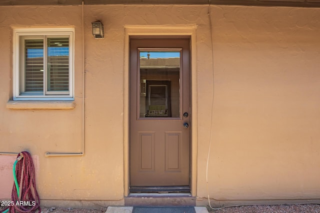 2015 E Southern Ave Unit 16, Tempe, AZ 85282 - doorway to property featuring stucco siding